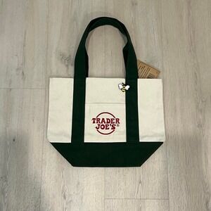 Trader Joe's mini canvas tote bag with green handle and trim red logo w/ bee pin
